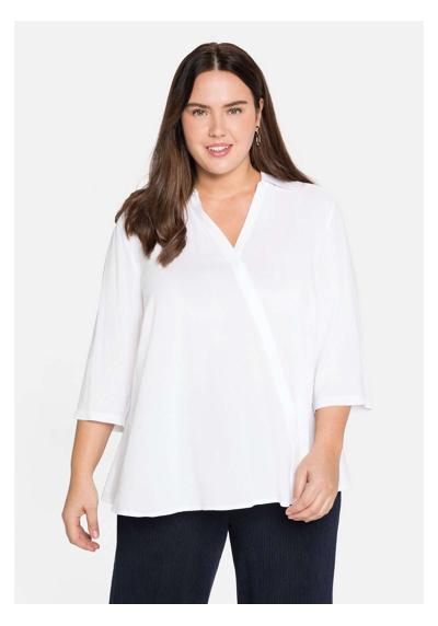 Блузка-рубашка с запахом и планкой на потайных пуговицах.