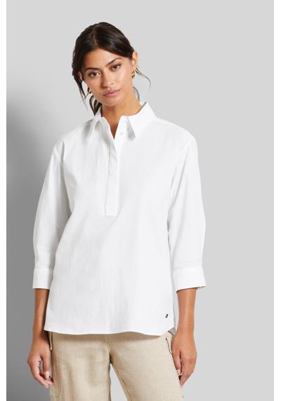 Блузка с длинными рукавами из эластичного хлопка.
