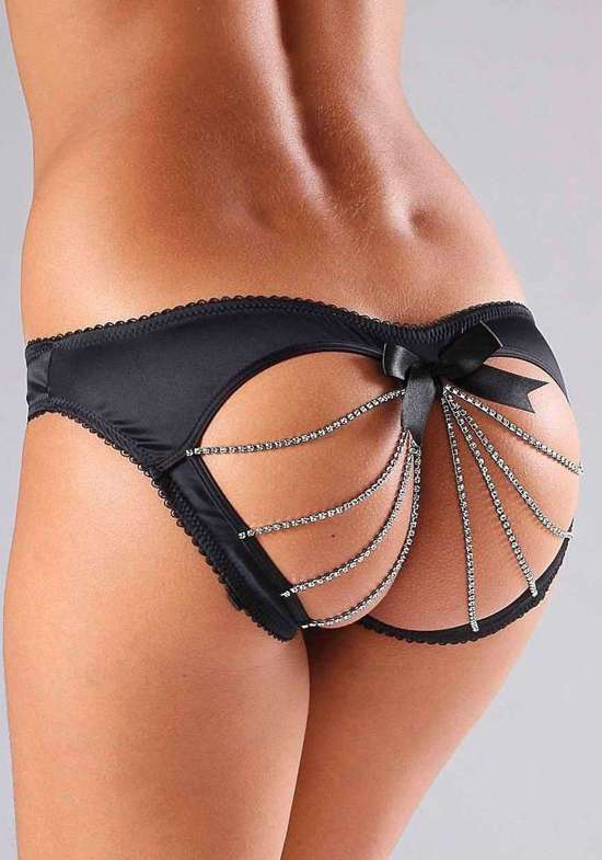 Открытый комбинезон с цепочками из стразов внизу.