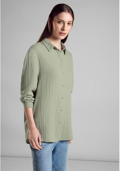 Блузка-рубашка, очень длинная, не гладкая.