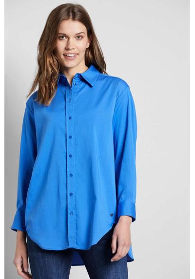 Блузка-рубашка из эластичной смесовой хлопчатобумажной ткани.