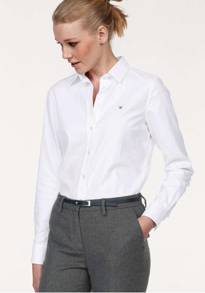Блузка-рубашка из эластичной ткани Оксфорд для комфортной посадки и свободы движений.