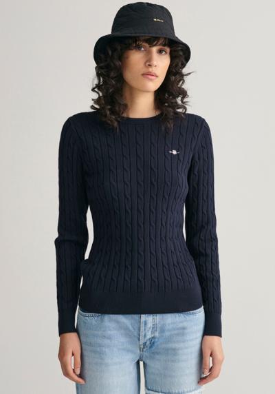 Вязаный свитер с вышитым логотипом на груди.