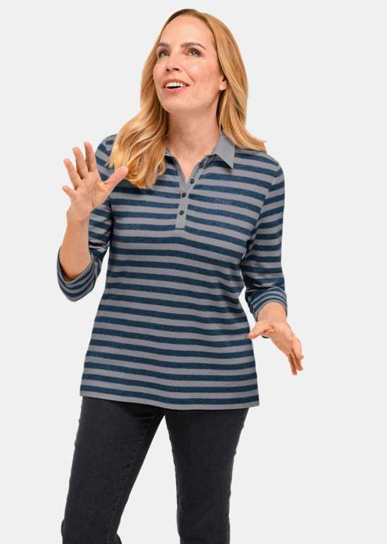 Качественная рубашка с длинными рукавами и воротником-поло.