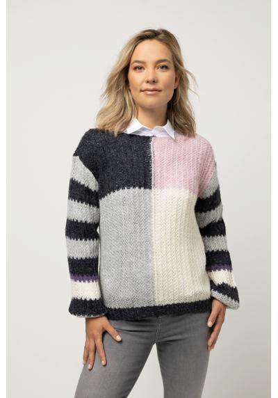 Вязаный пуловер-свитер оверсайз с круглым вырезом и длинными рукавами.